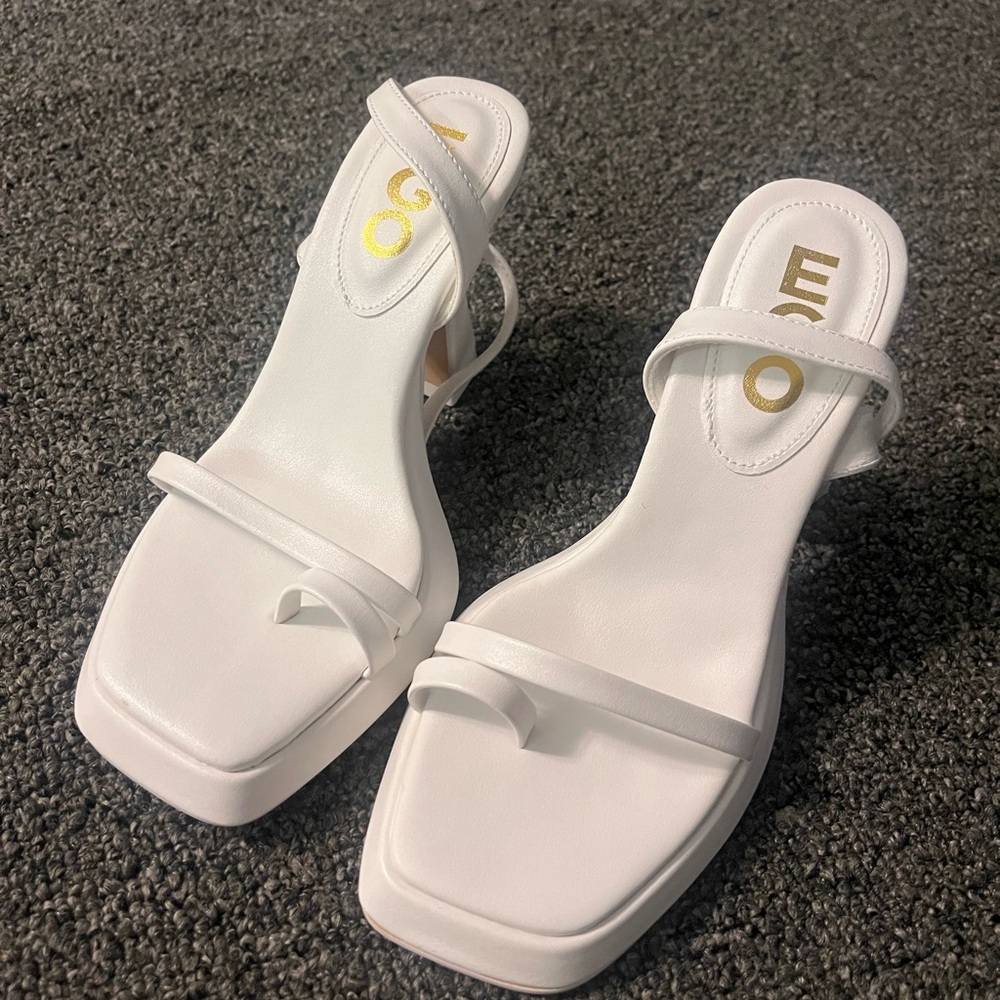 Eco white never worn heels.